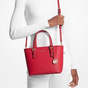 MK messenger in gorgeous bright red!! Perfect for summer!!